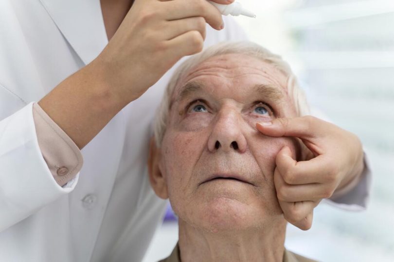 doctor-pouring-some-eye-drops-patient (1)